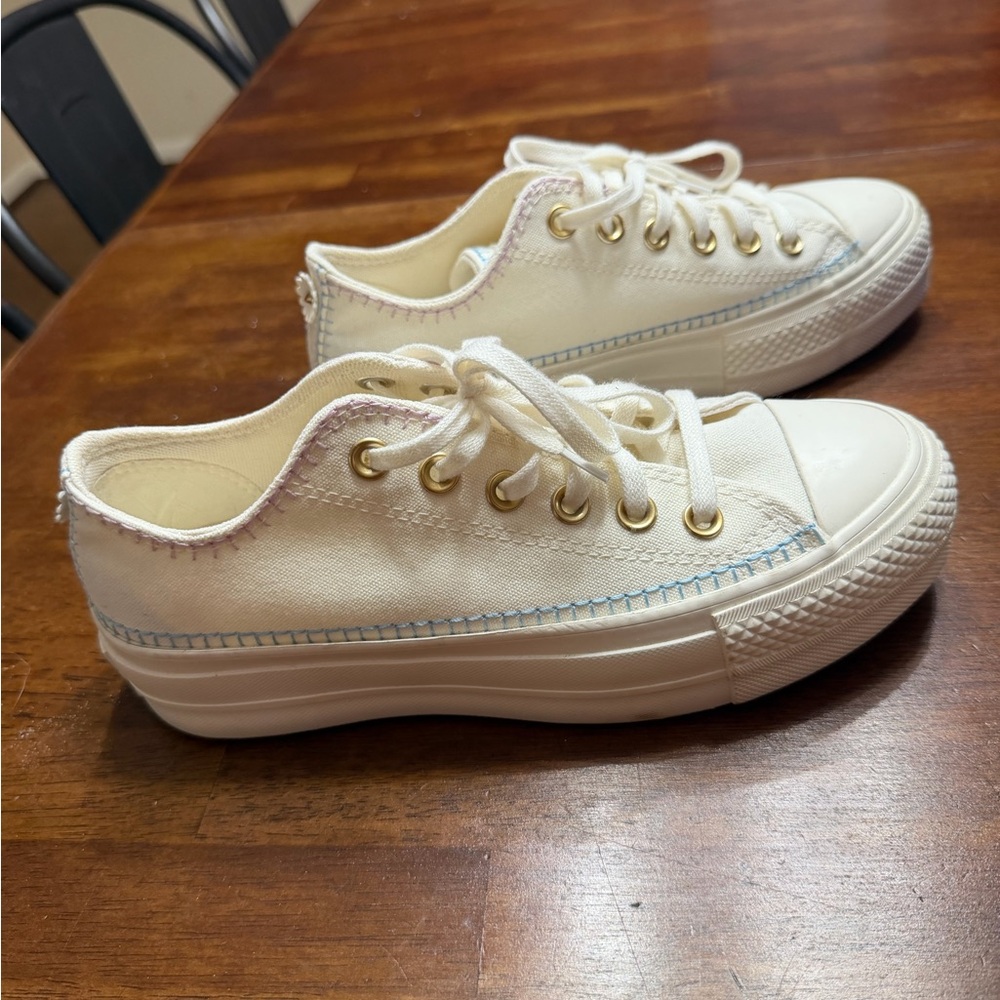 Converse women’s Cream Sneakers with Floral Accent